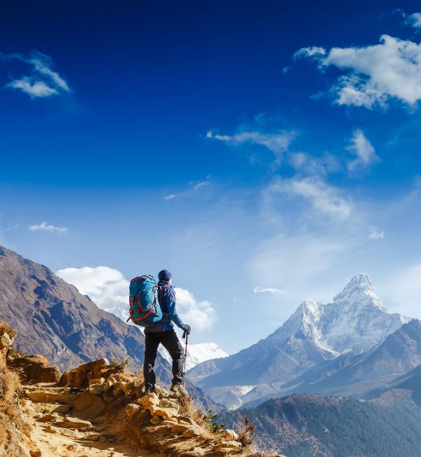 Mountaineer overlooking Mount Everest Peak